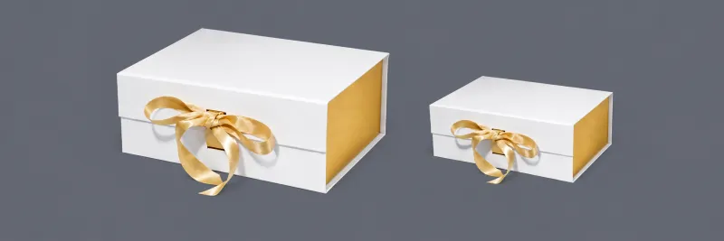 Eleganckie złote pudełka prezentowe.png